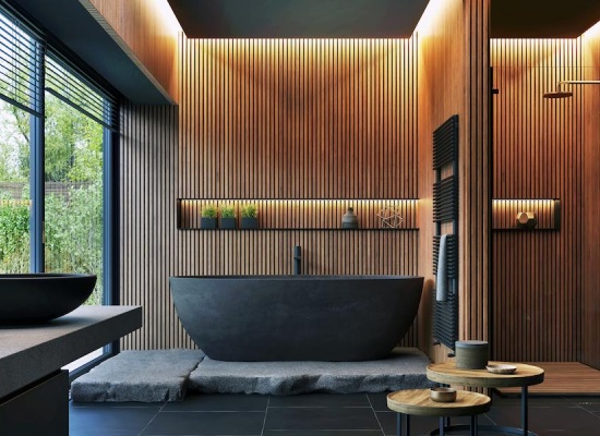 Salle de bain murs en bois et baignoire noire