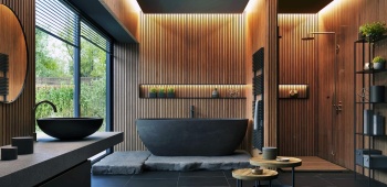 Salle de bain murs en bois et baignoire noire