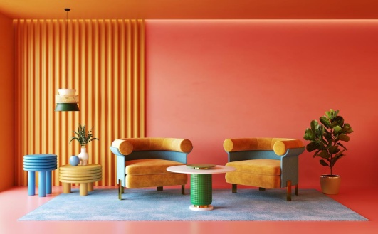 Salon orange avec fauteuils et déco géométrique.